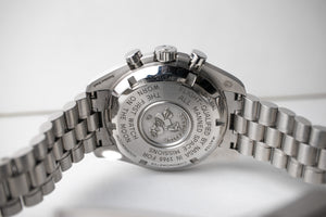 Omega Speedmaster Moonwatch referance 310.30.42.50.01.001 stainless steel caseback with the omega logo and hippocampus and Flight Qualified by NASA in 1965 for All Manned Space Missions The First Watch Worn on the Moon 