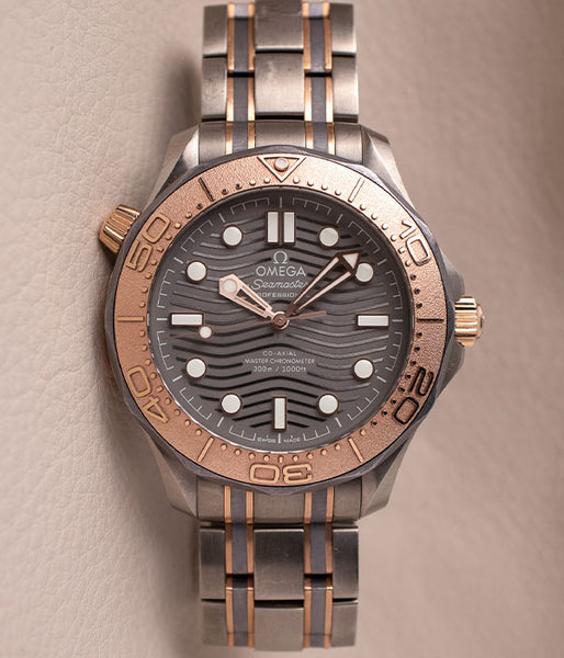 Omega Seamaster 300M Titanium Tantalum Sedna Gold 210.60.42.20.99. Belmont Watches