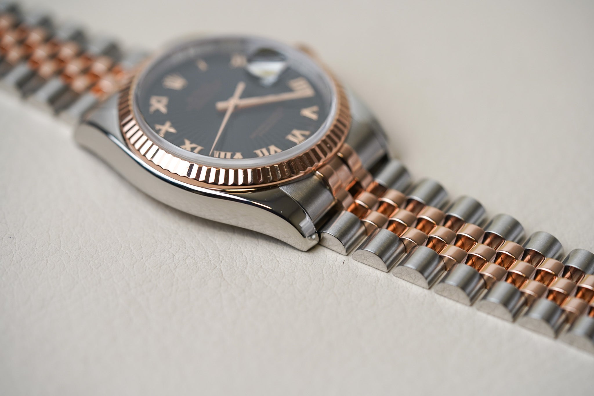 Rolex Datejust 36 Black Sunbeam Roman Dial Rose Two Tone 116231