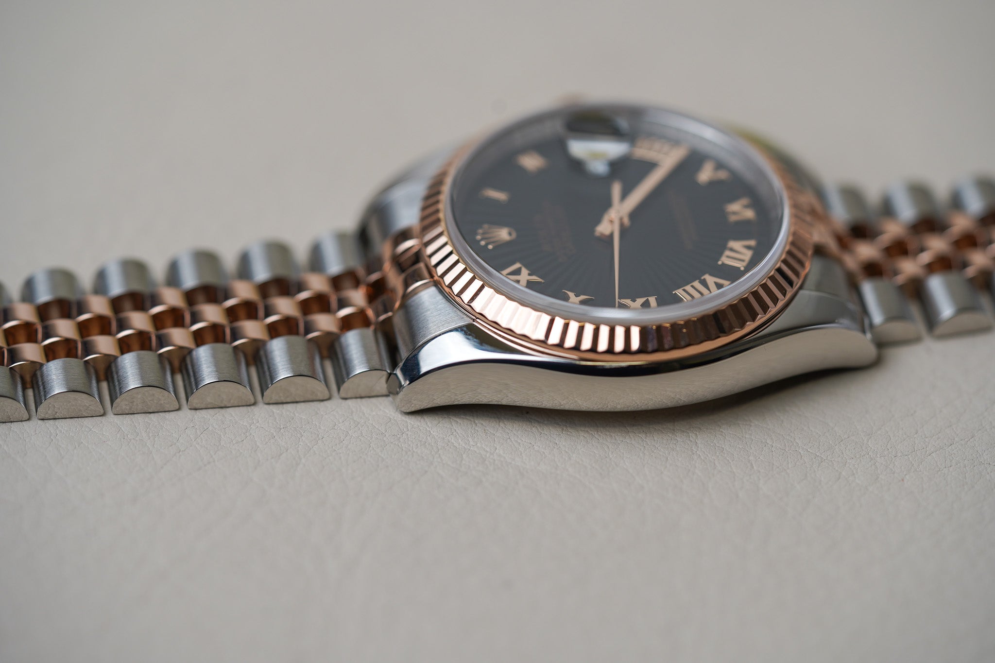 Rolex Datejust 36 Black Sunbeam Roman Dial Rose Two Tone 116231