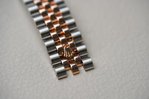 Rolex Datejust 36 Black Sunbeam Roman Dial Rose Two Tone 116231
