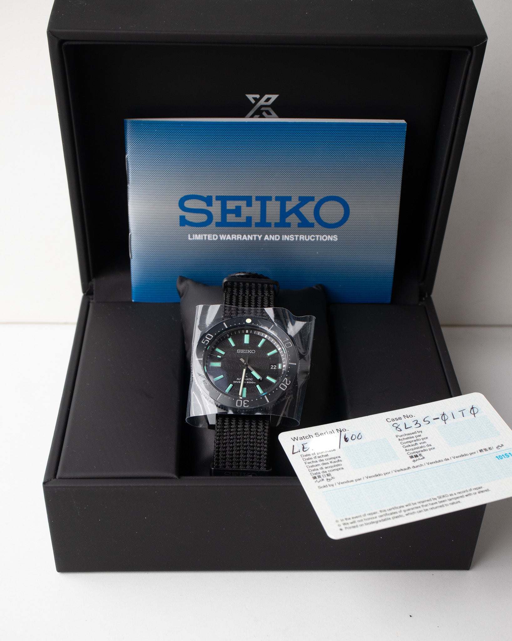 Seiko Prospex reference SLA067 watch with the watch box, booklets, and warranty card