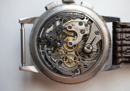 Pre-Owned: 1950’s Lemania CH27C12 Chronograph Bullseye Tourneau Stamp